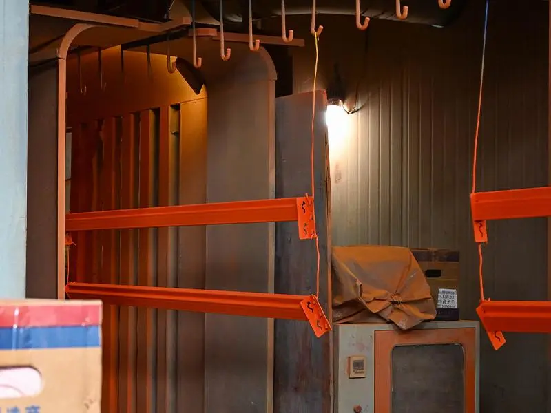Electrostatic powder coating booth and curing ovens
