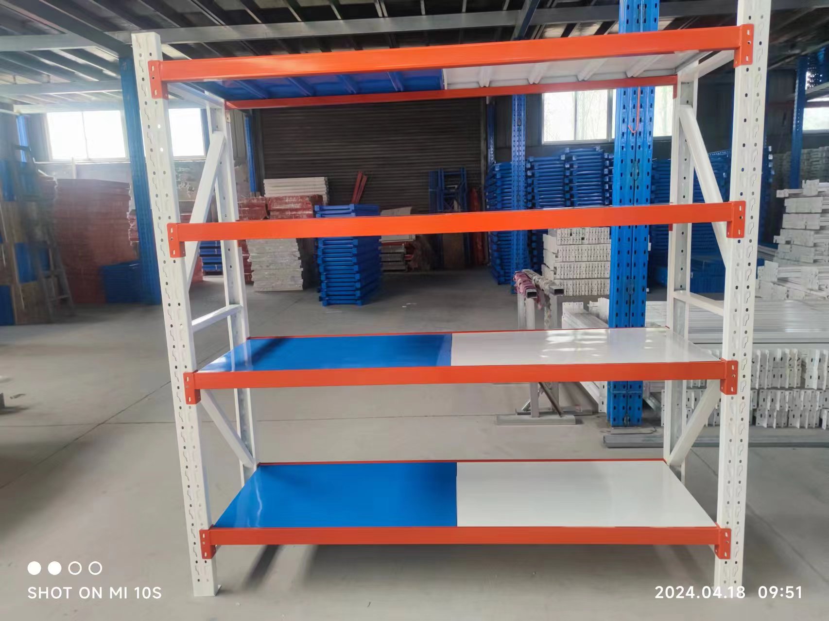 Medium Duty Steel Warehouse Rack Storage Shelf with 300 kg Capacity Adjustable Height Durable Construction for Garage Use